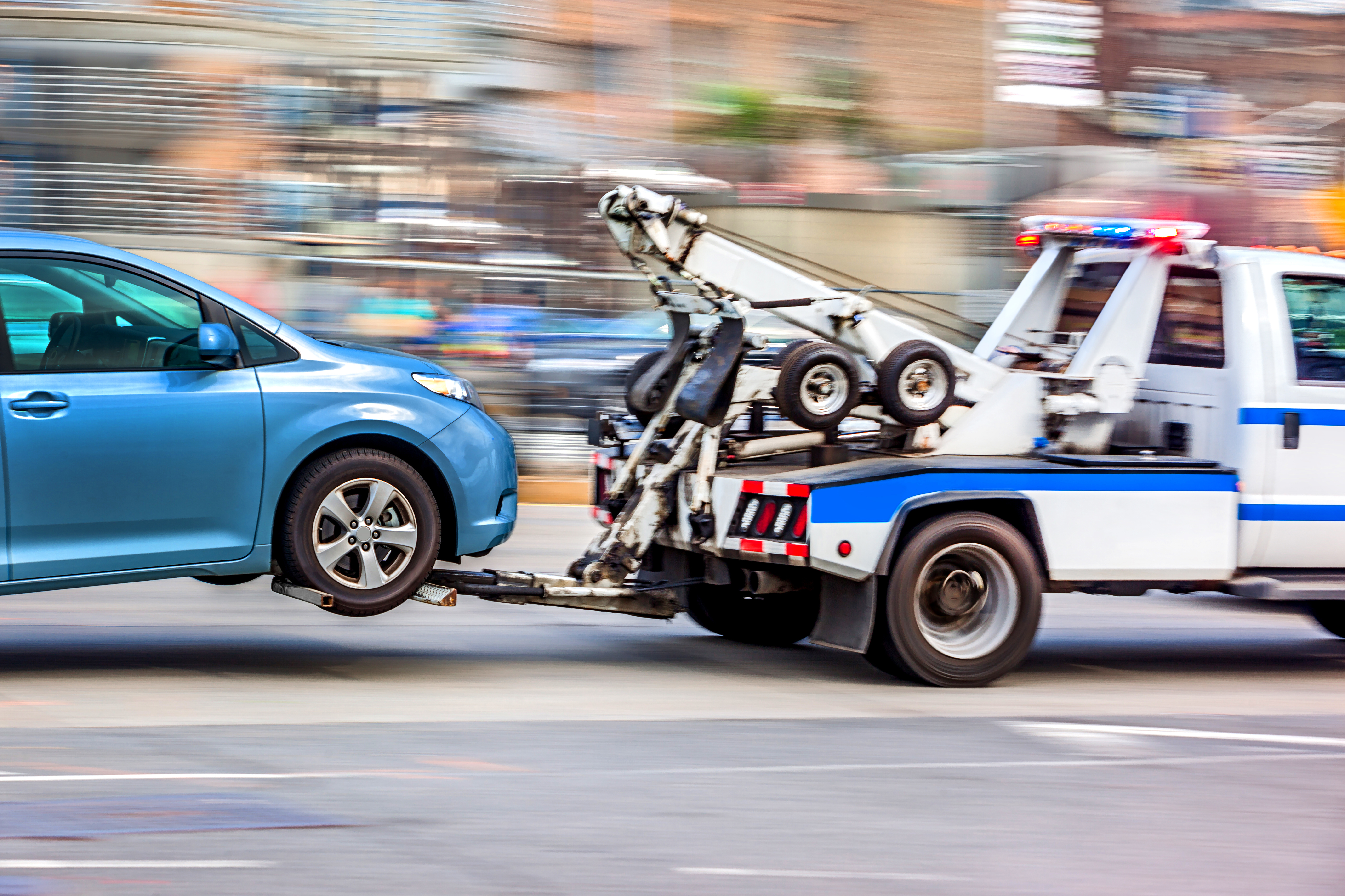 adobestock_176564173-tow-truck.jpg